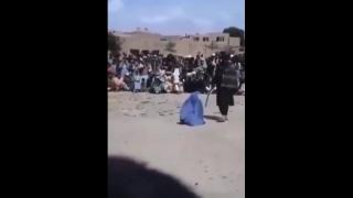 The whole village has turned out to watch her being punished. Why? What has she done?