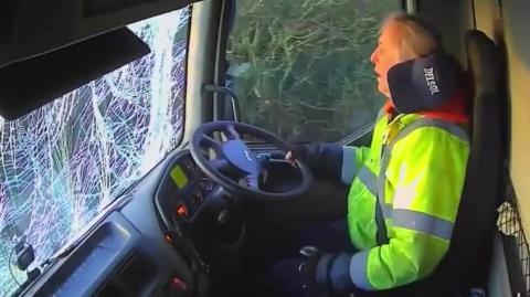 A Truck Driver is Blinded by the Setting Sun - and -