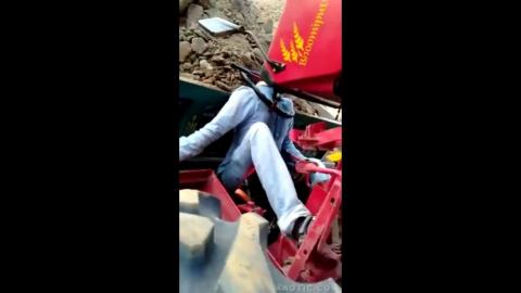 Pajeet's Ultimate Wheelie  -- Tractors do have Roll Over Protection Bars... They would have saved him.