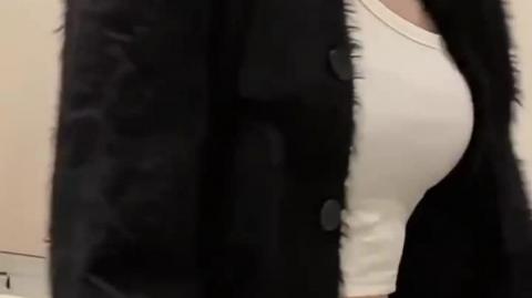 Black Short-Length Button-Up Sweater for a Chic and Playful Vibe