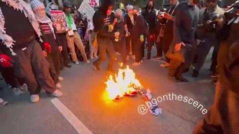 Flag burning outside the Consulate General of Israel in Chicago
