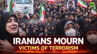 Iranians mourn victims of demonstrations as Tehran holds massive funeral