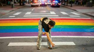 Man arrested after police say he tried repainting a rainbow crosswalk