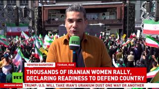 Iranian women rally in Tehran declaring readiness to protect their country