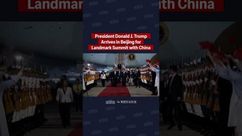 President Trump lands for a landmark summit with China