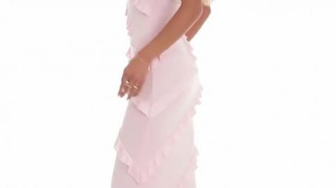 Elegant women's spaghetti strap evening dress with flowing long skirt and romantic style
