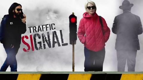 Manipulating traffic lights to let the target know that he's on watch Government targeting watchlist