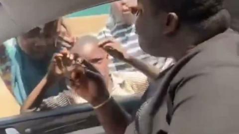 Eating like a pig and mocking hungry children